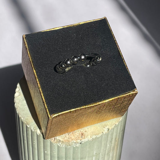 Anillo Anti Estrés con Cuentas Giratorias